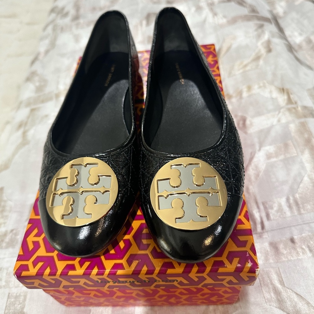 Tory Burch Black Ballet Flats with Iconic Gold and Silver Logo